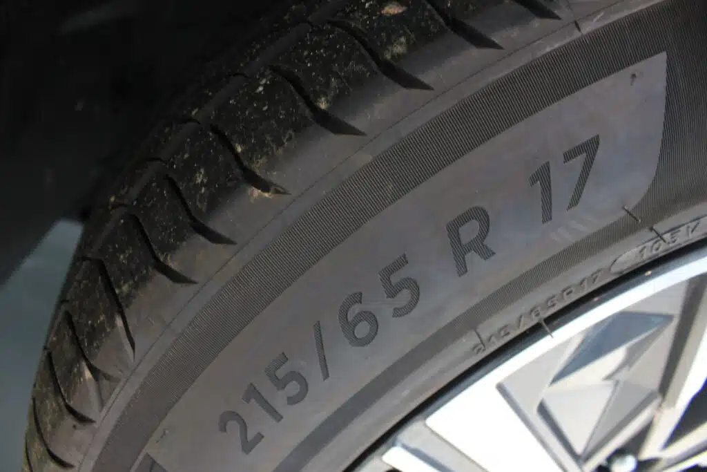 close up of numbers and letters on the sidewall of a tire